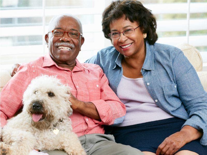 retired couple with their dog