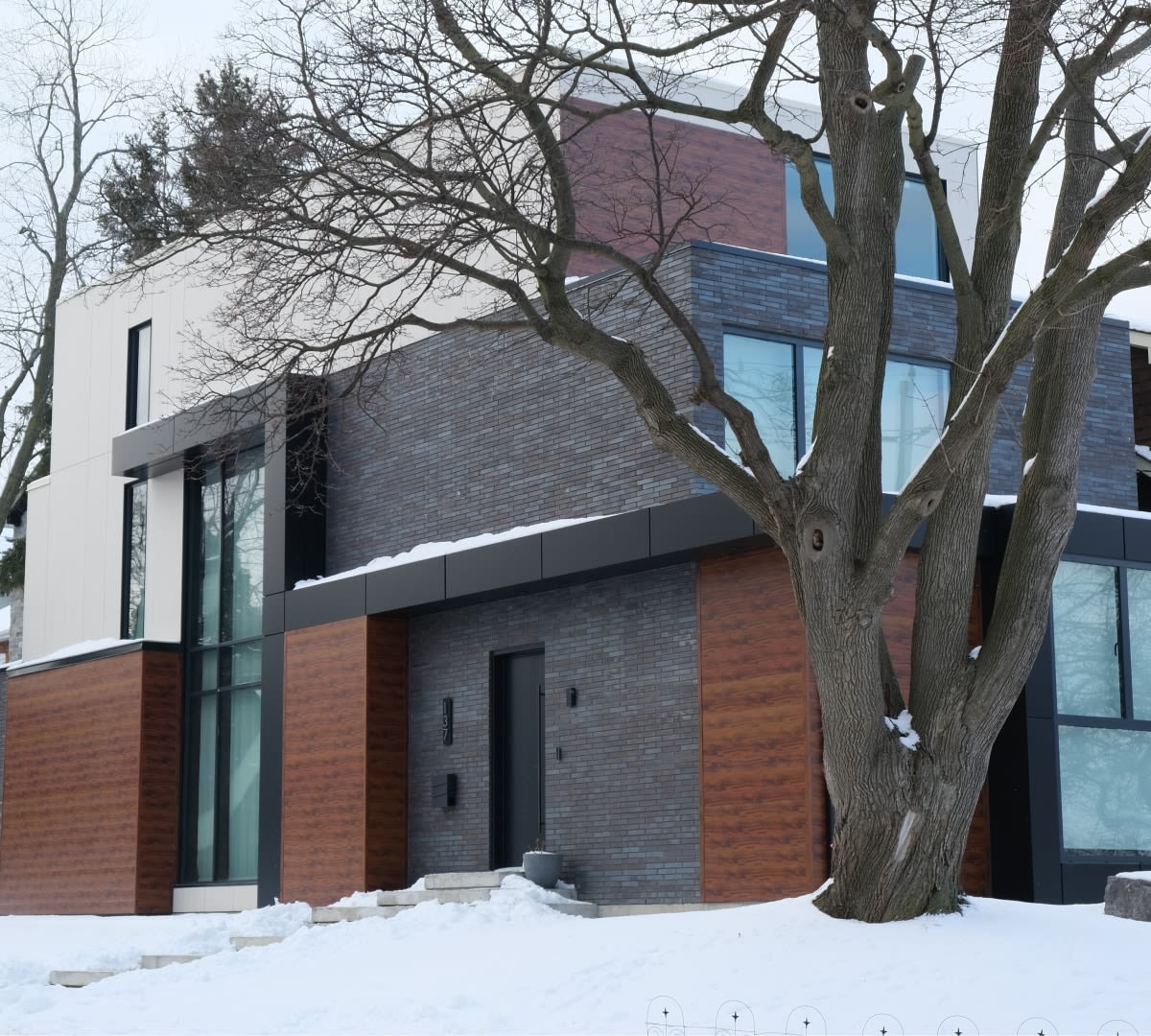 Exterior of house with dark grey brick.