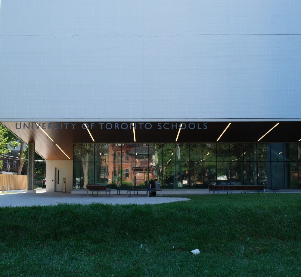 White brick overhang with glass windows