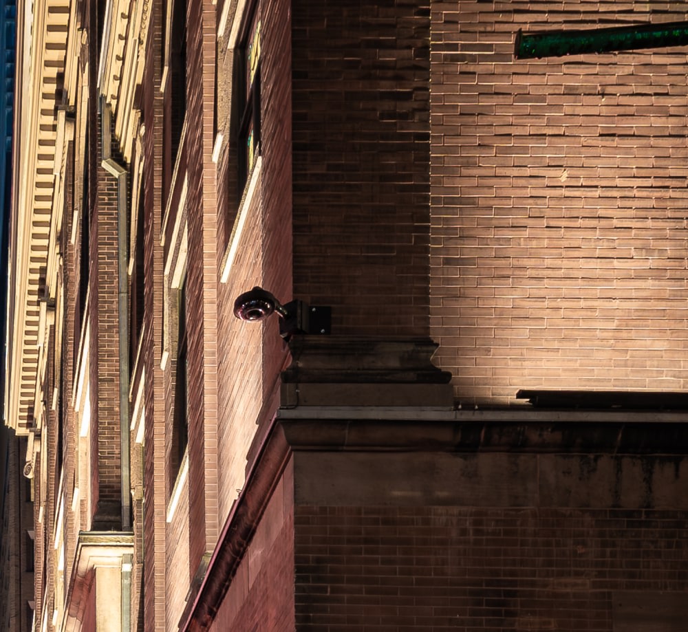 Closeup view of red brick on the exterior of Massey Hall.