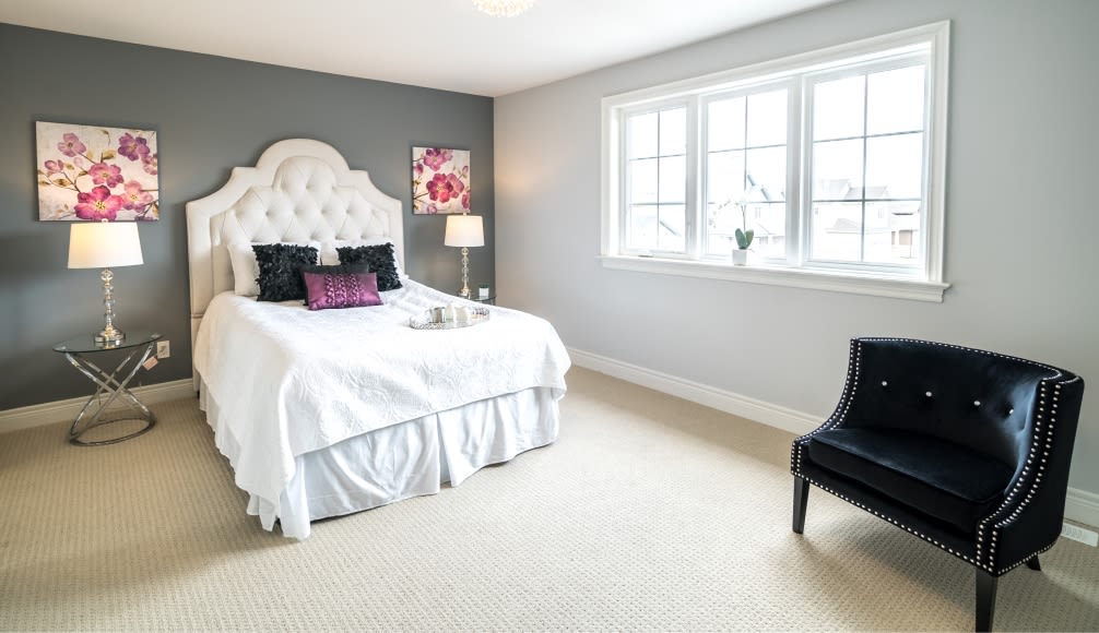 Staging of a master bedroom in stoney creek