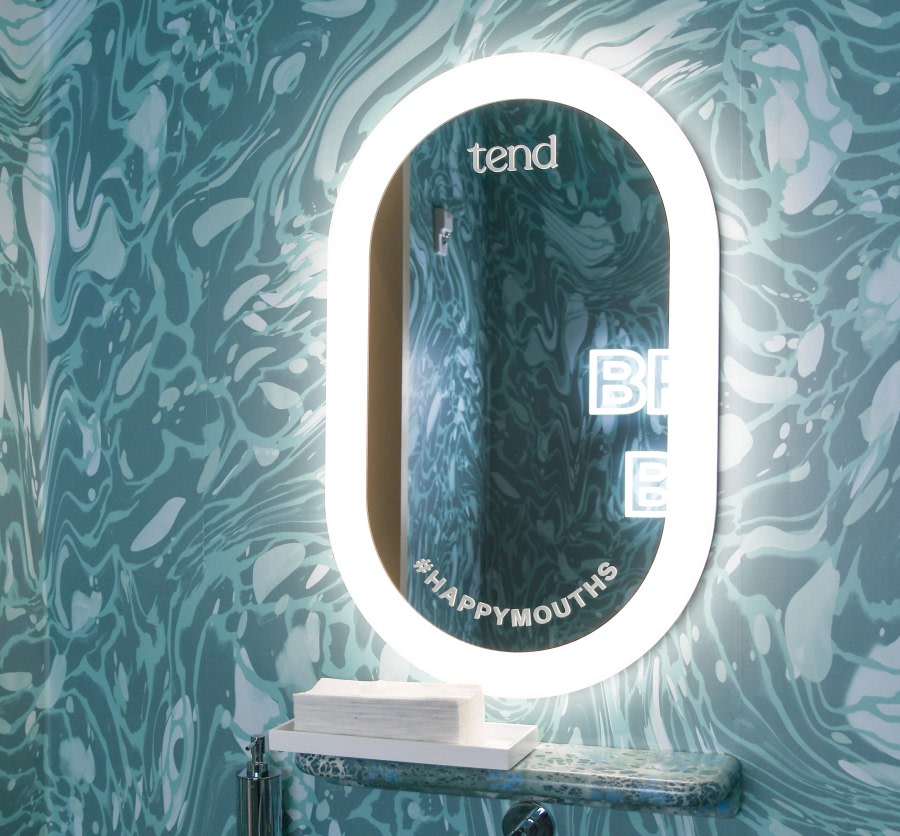 Sink and mirror in teeth brushing area.