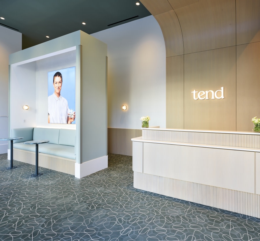 Dental reception desk and seating area.