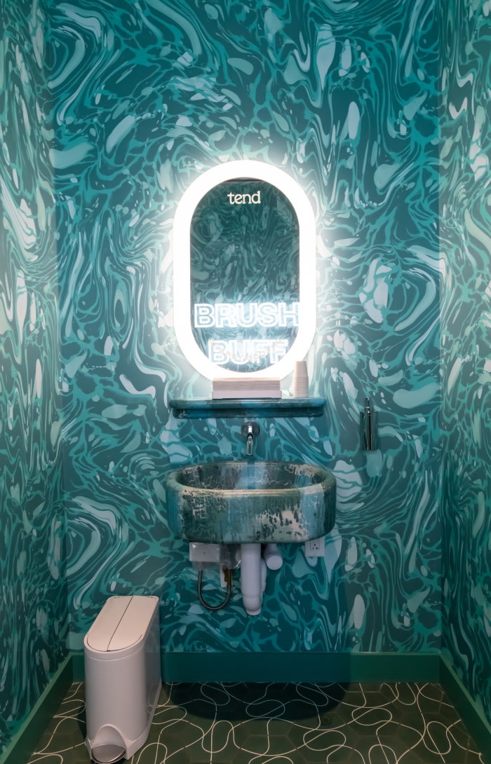 Sink and mirror in teeth brushing area.