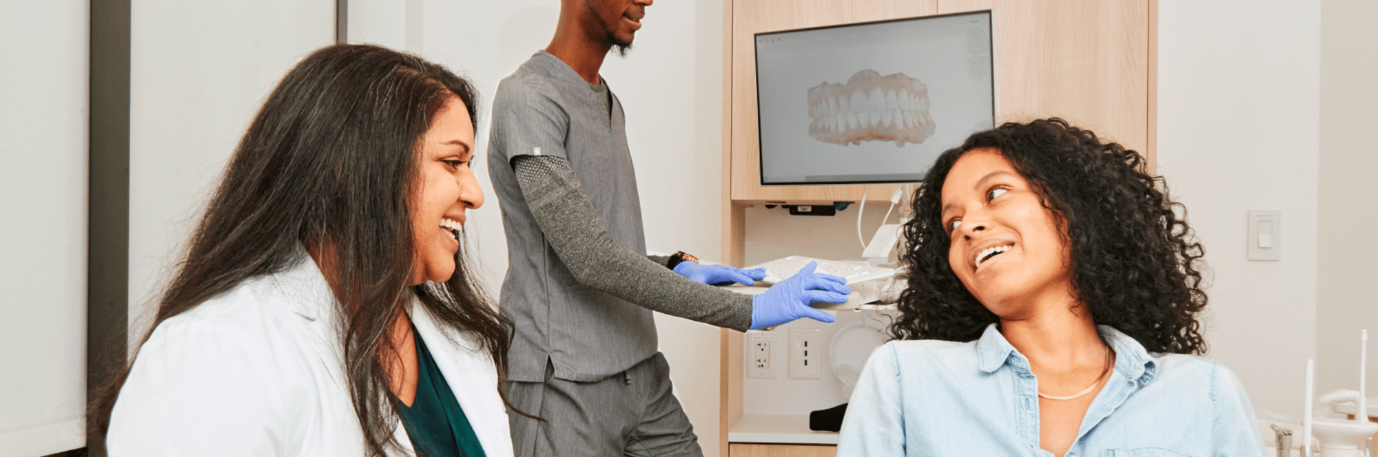A patient speaks with a team member.