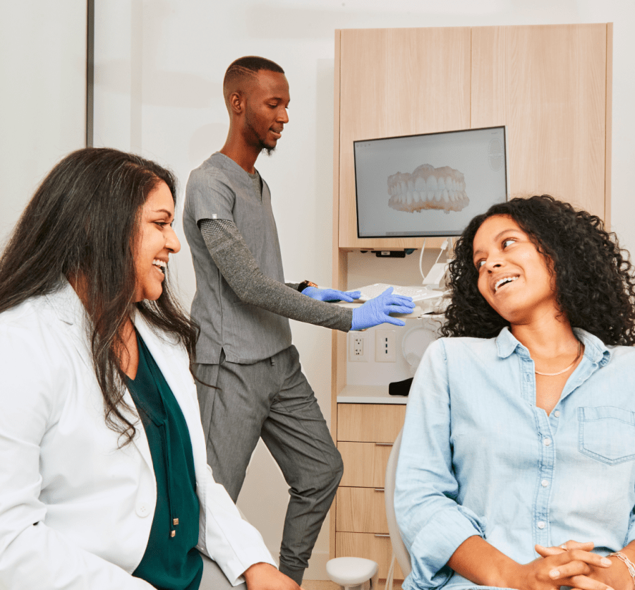 A patient speaks with a team member.