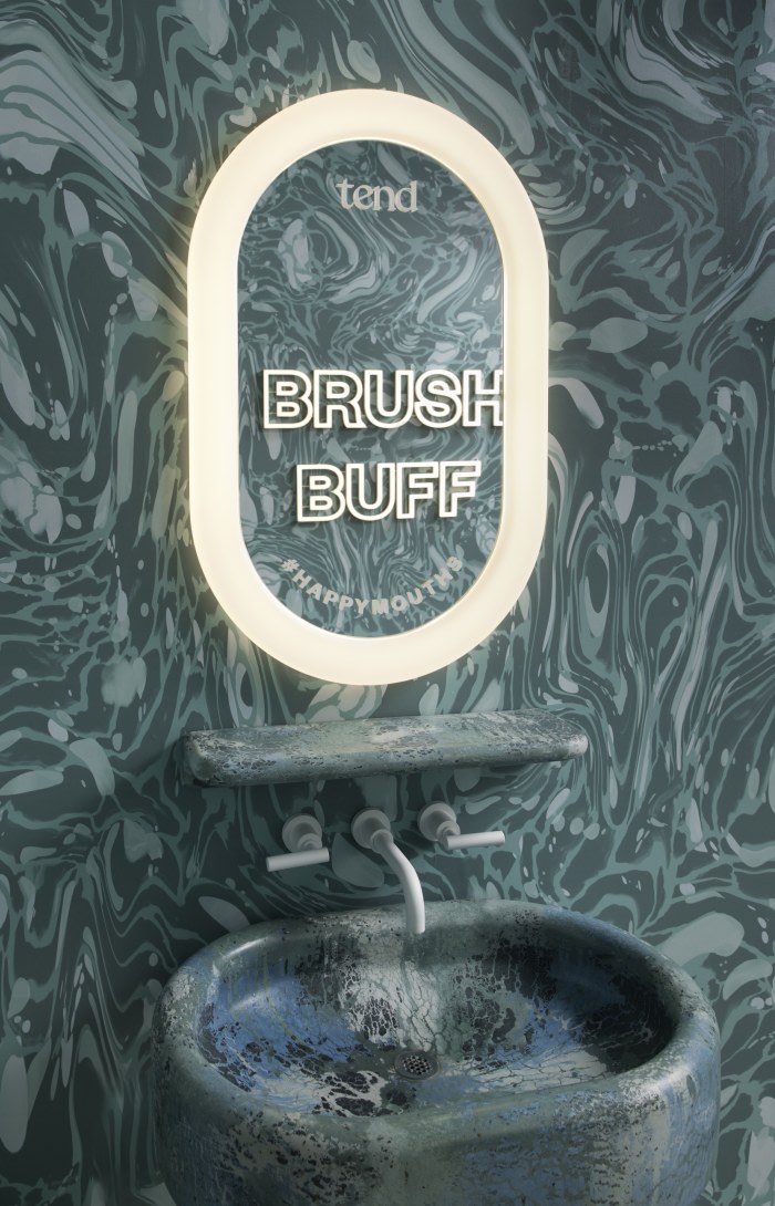 Sink and mirror in teeth brushing area.