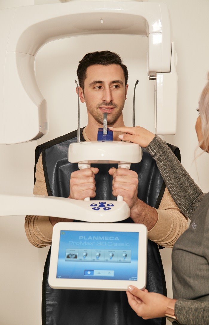 A patient gets a dental X-ray.