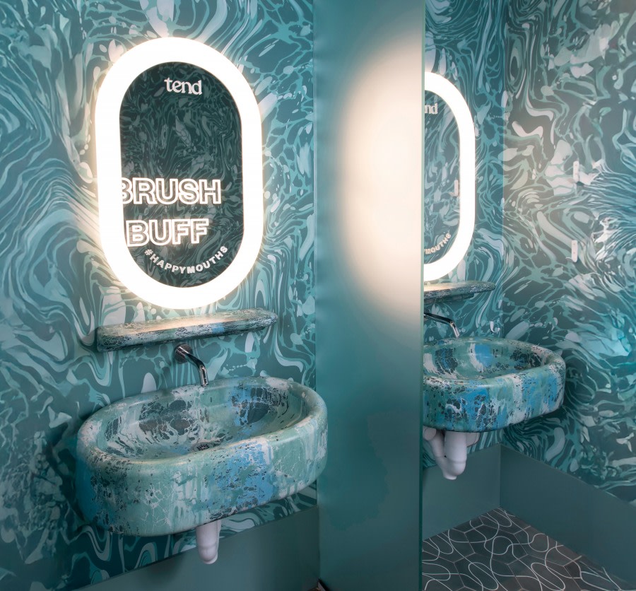 Sink and mirror in teeth brushing area.