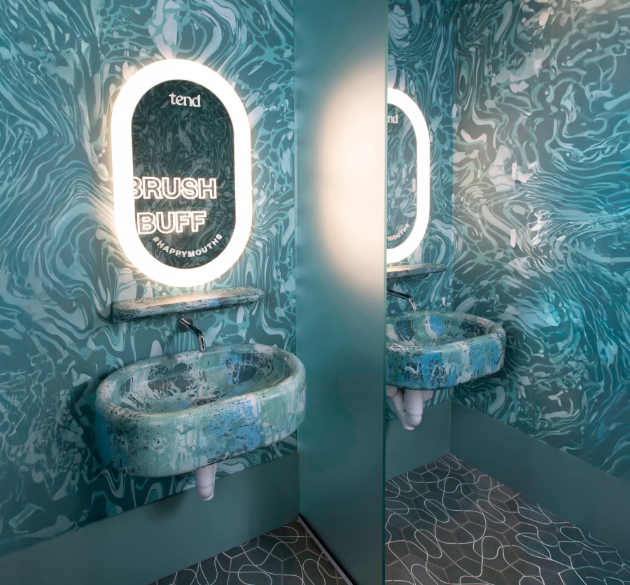 Sink and mirror in teeth brushing area.