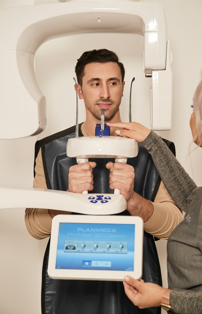 A patient gets a dental X-ray.