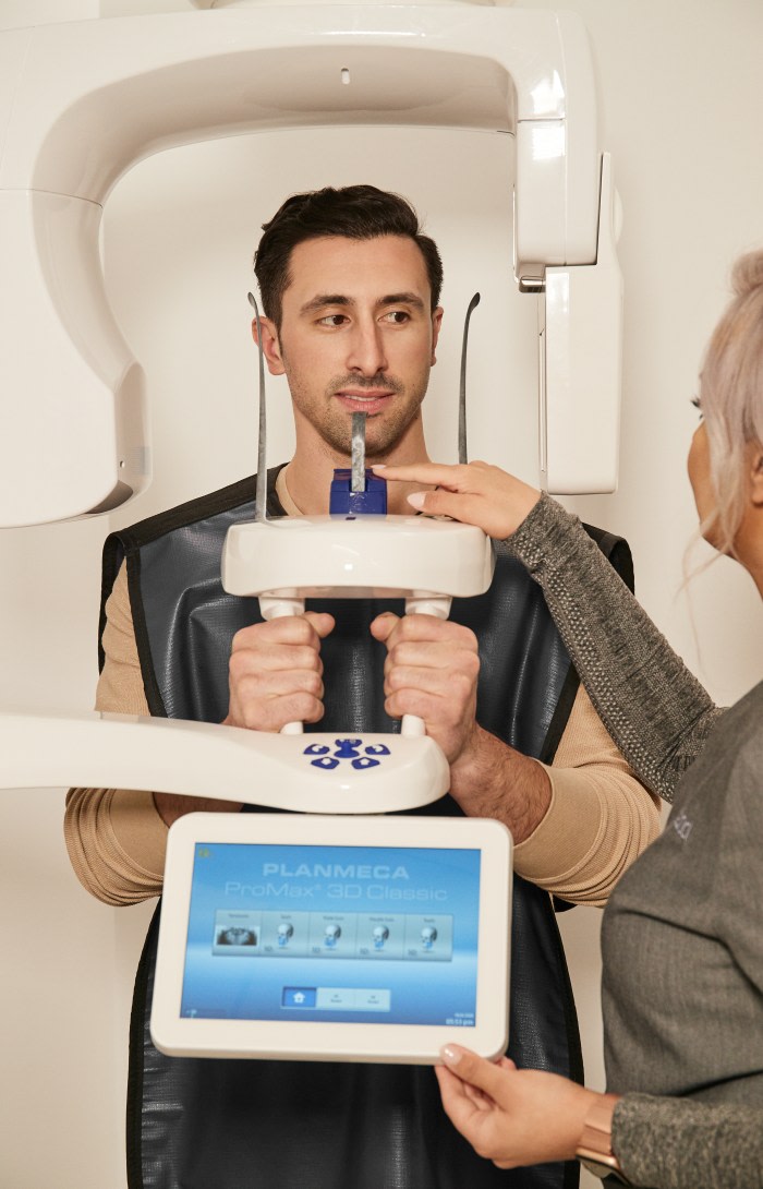 A patient gets a dental X-ray.