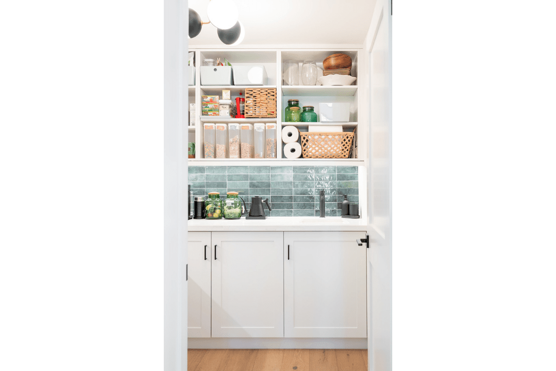 transitional-kitchen-wood-stained-cabinetry-pantry-storage