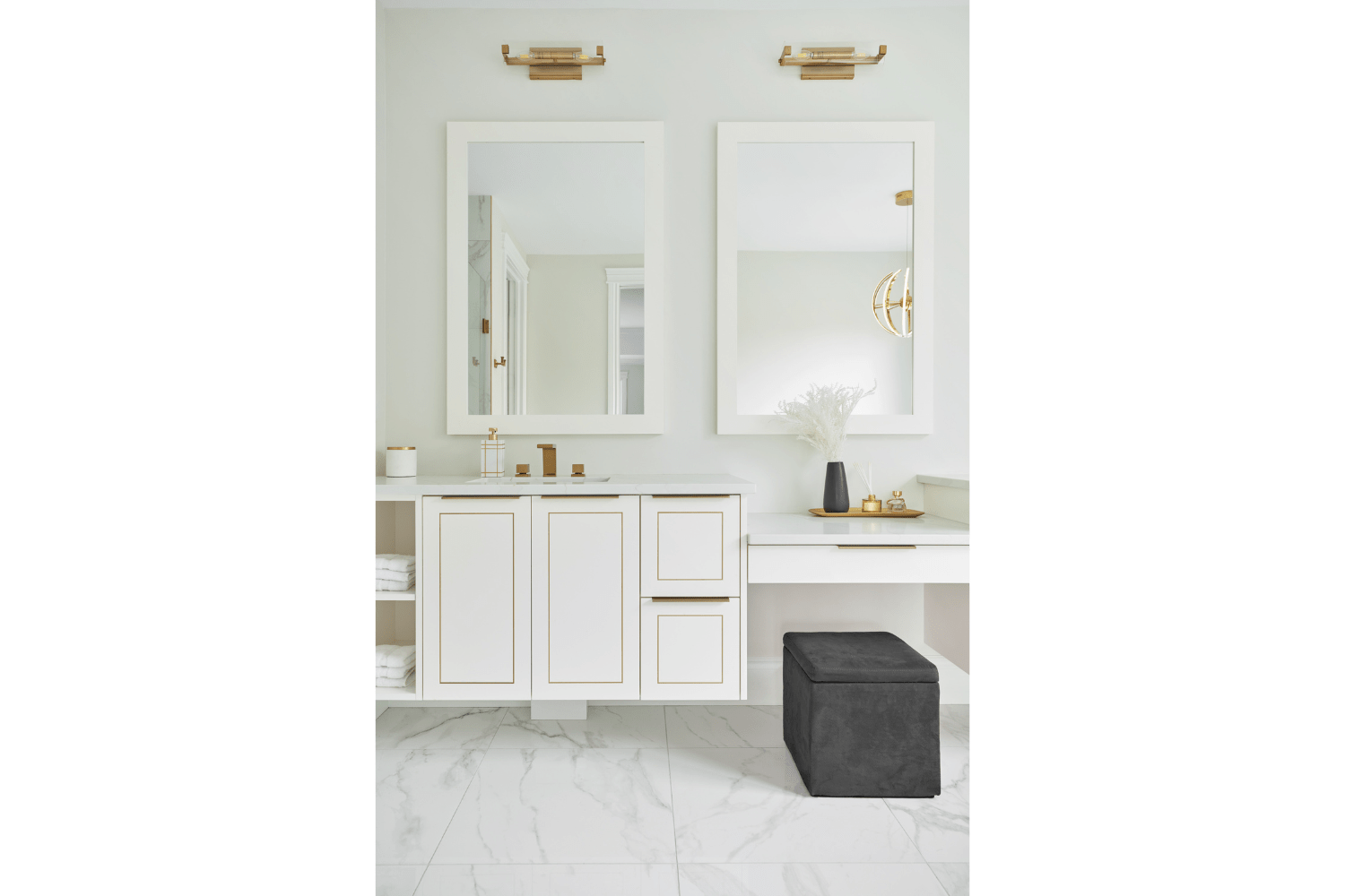 White & gold master ensuite with makeup counter and open storage