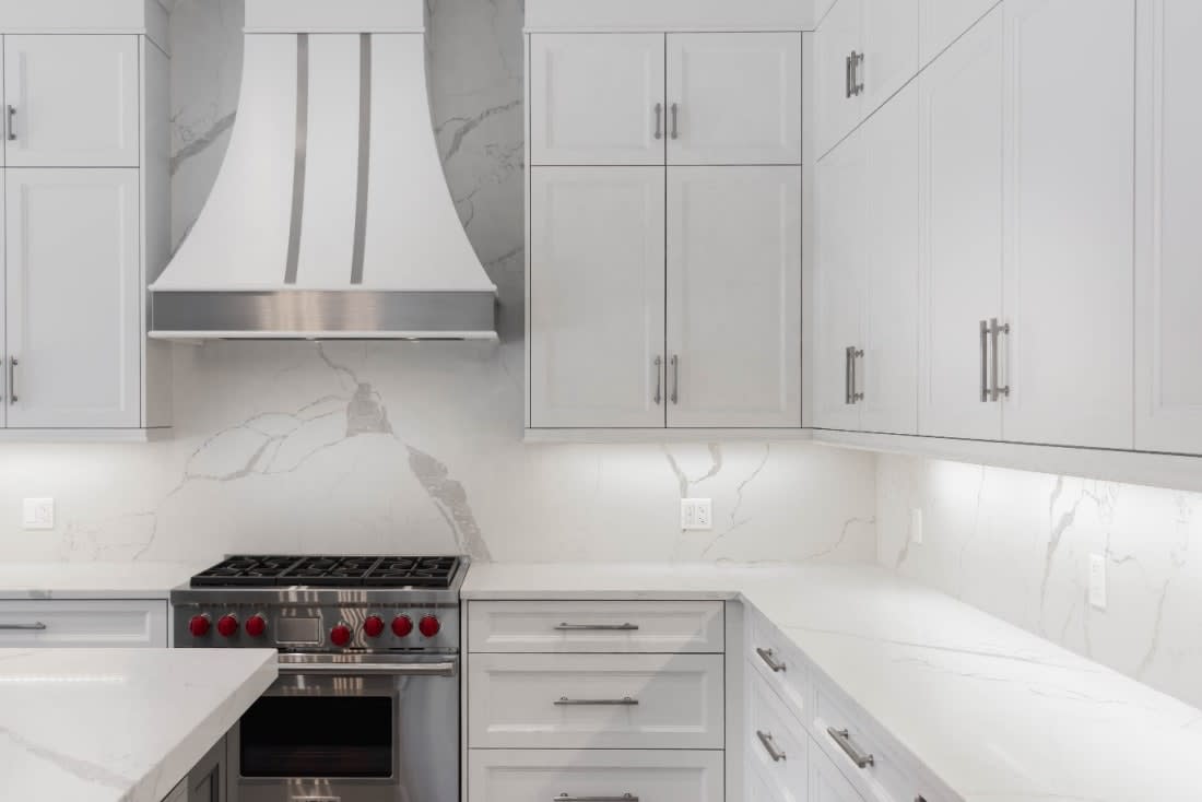 White kitchen cabinetry with straight corner cabinets