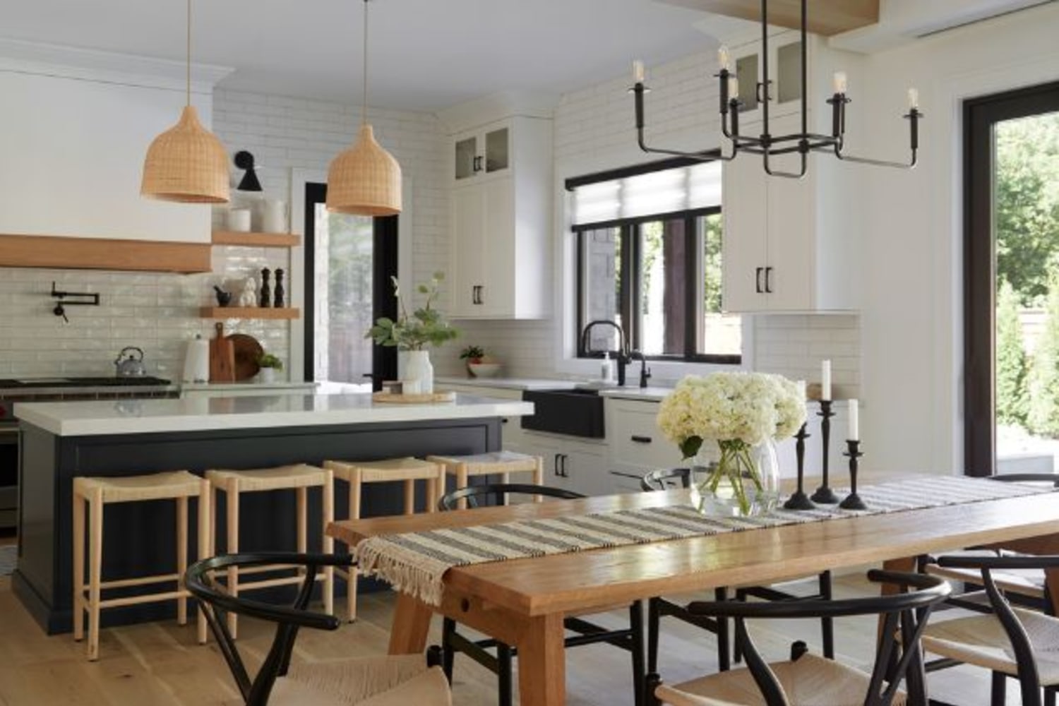 Custom range hood in white oak kitchen