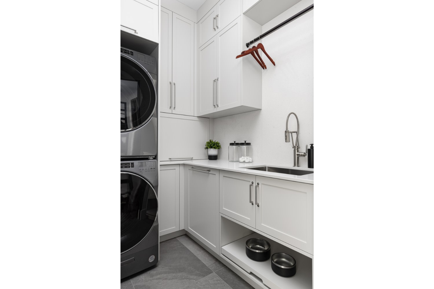 Classic White Laundry Room in Contemporary Cottage