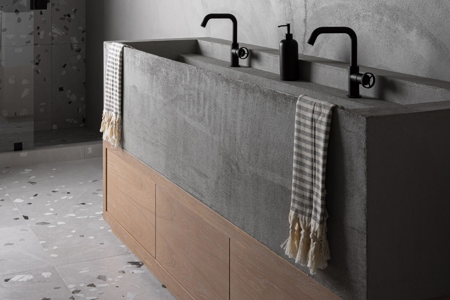 garage bathroom with concrete top bathroom vanity