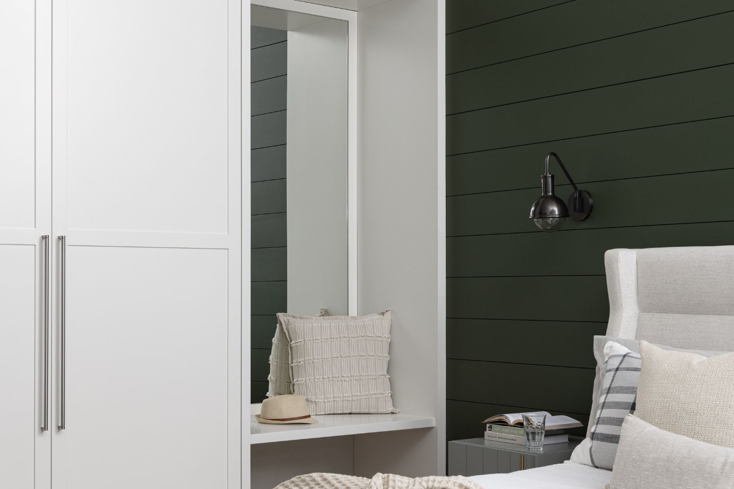 Bangor Lodge guestroom closet with floating bench and mirror