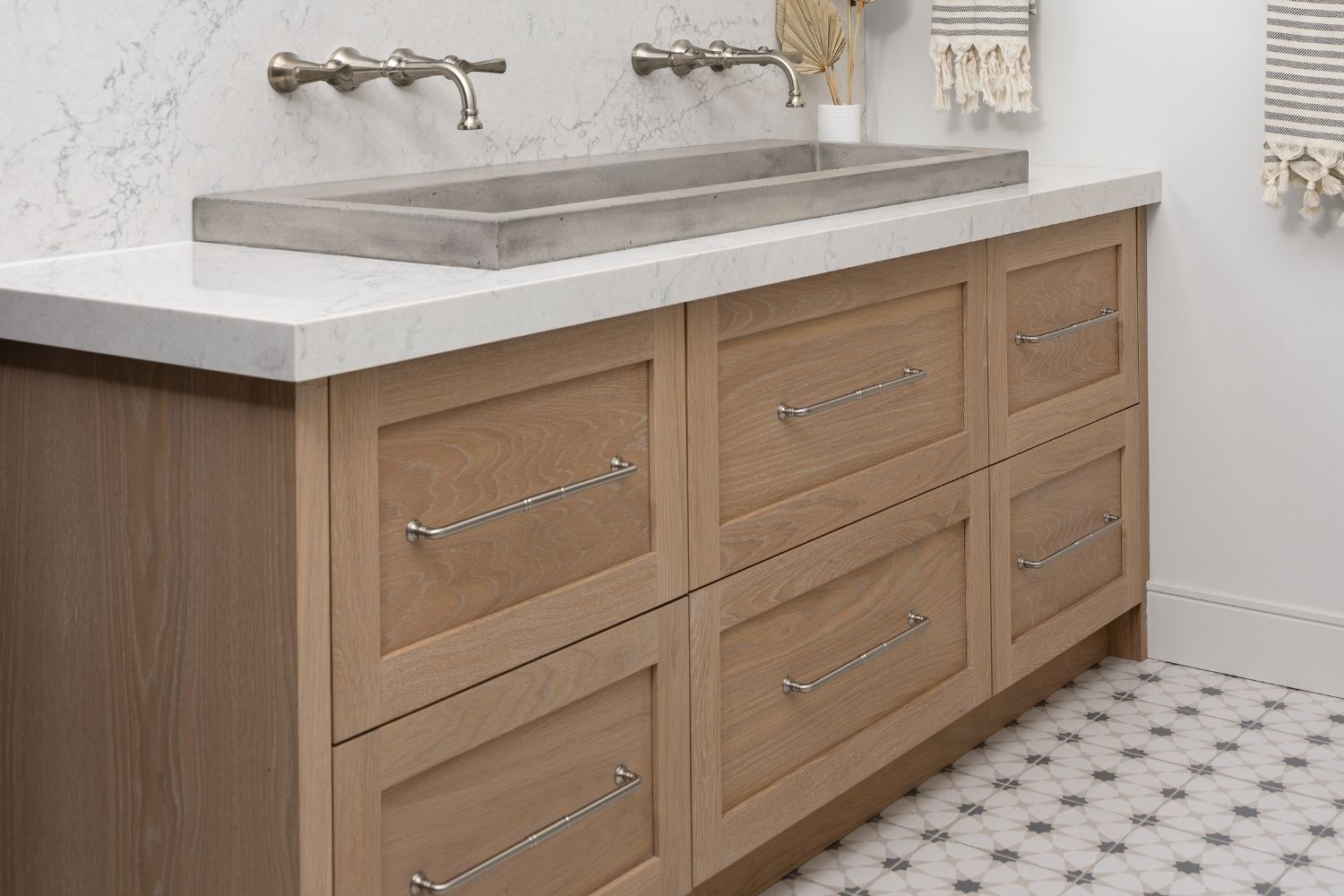 Bangor Lodge white oak bathroom vanity with white countertop