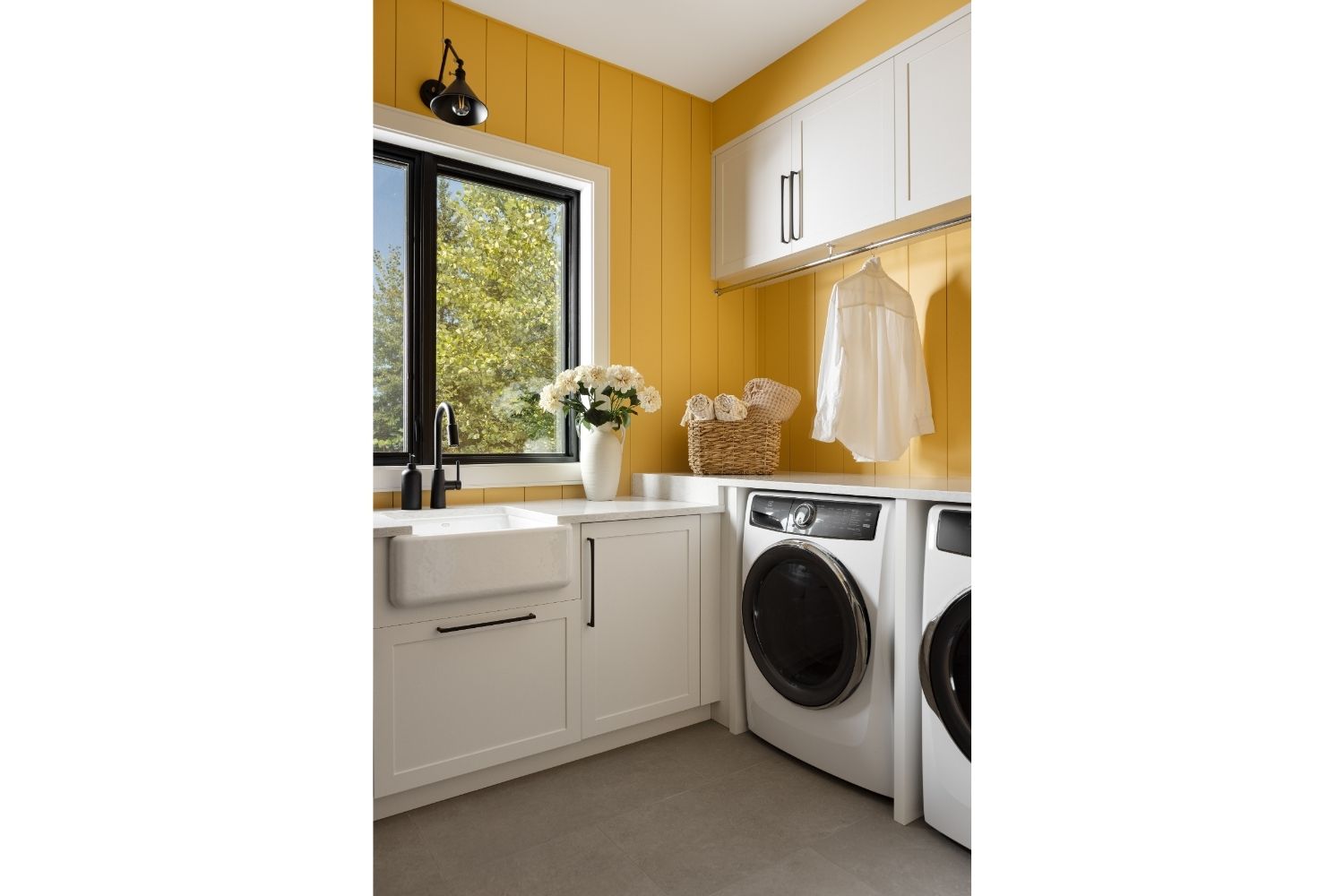 Bangor Lodge bright laundry room with yellow walls