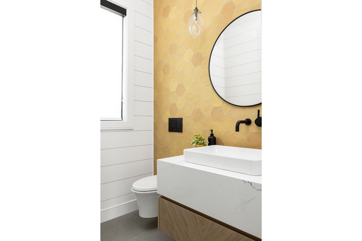 Bangor Lodge powder room with yellow tiled wall