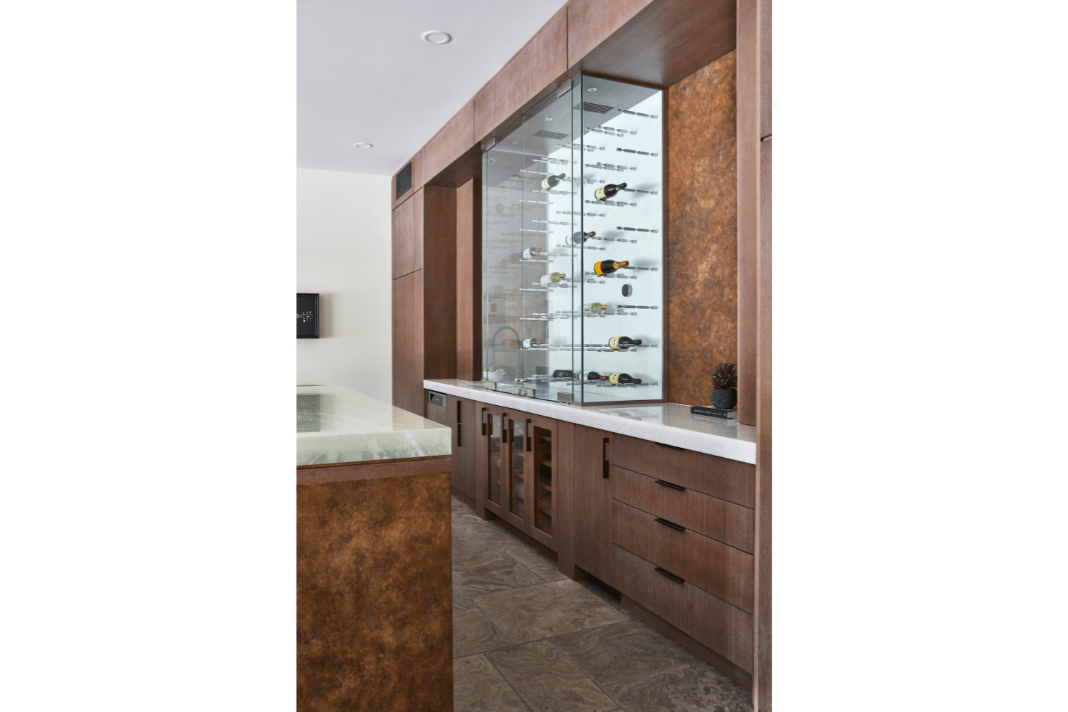 Project Coach House bar cabinetry with wine wall