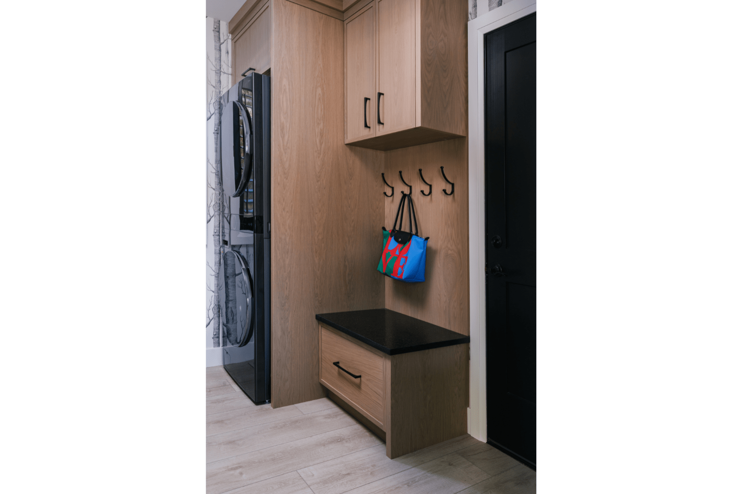 Project Maplewood laundry room with mudroom bench and storage