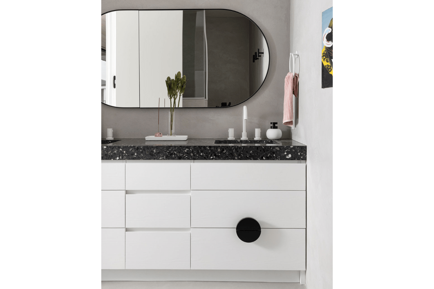 Guest bathroom design with white vanity and custom button knob