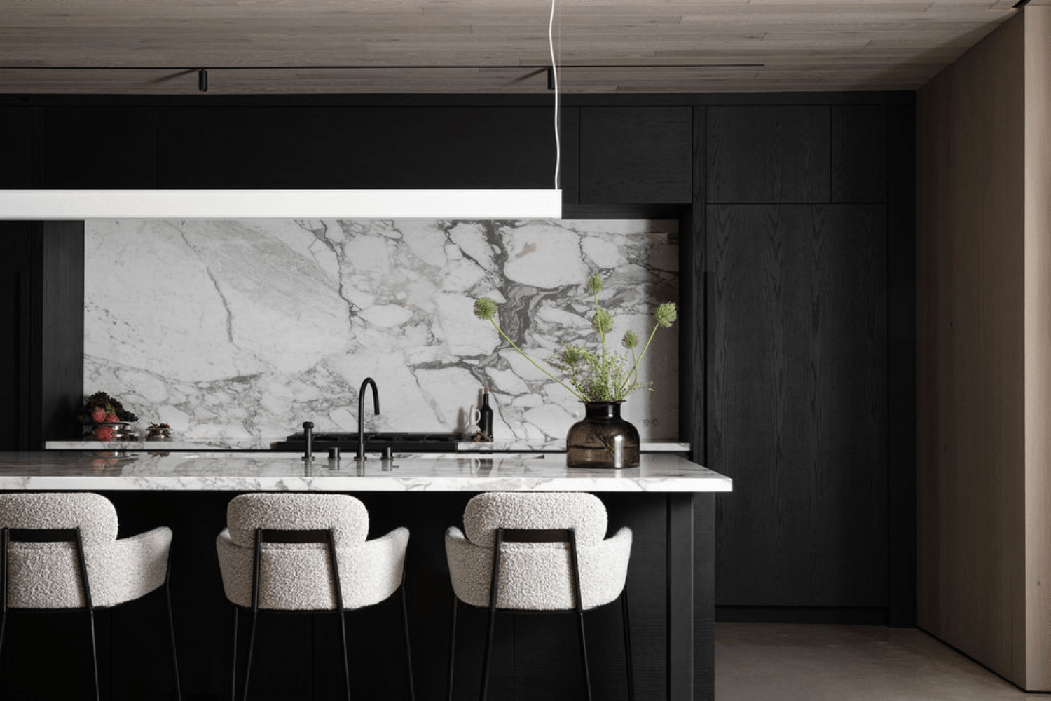 Black kitchen cabinets in modern industrial kitchen design