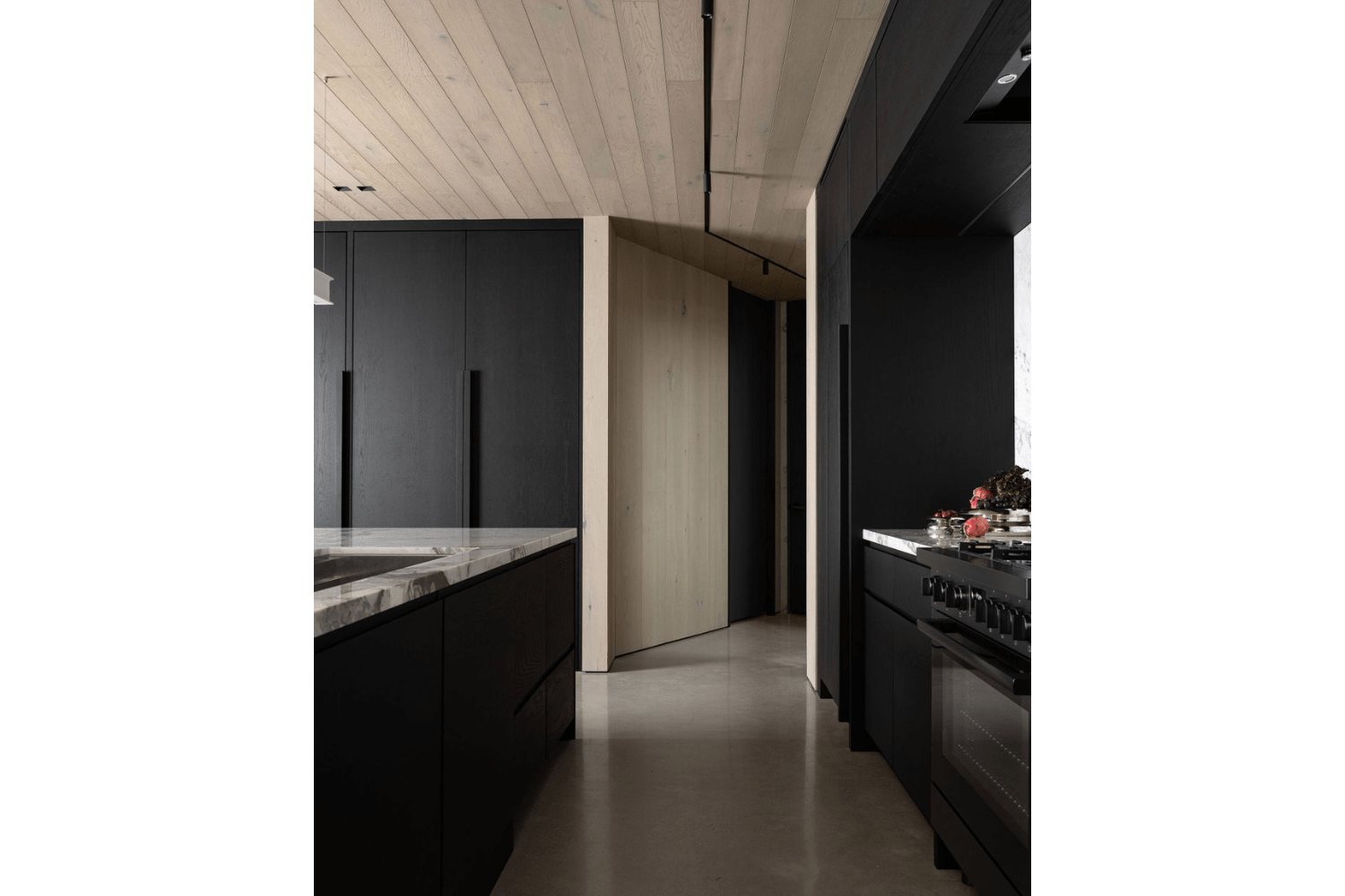 Modern kitchen design with black cabinets and kitchen island