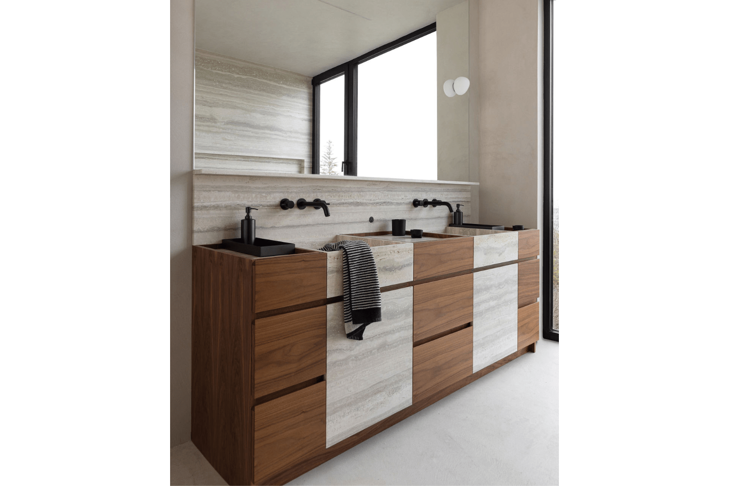 Walnut bathroom vanity with integrated finger pulls and stone