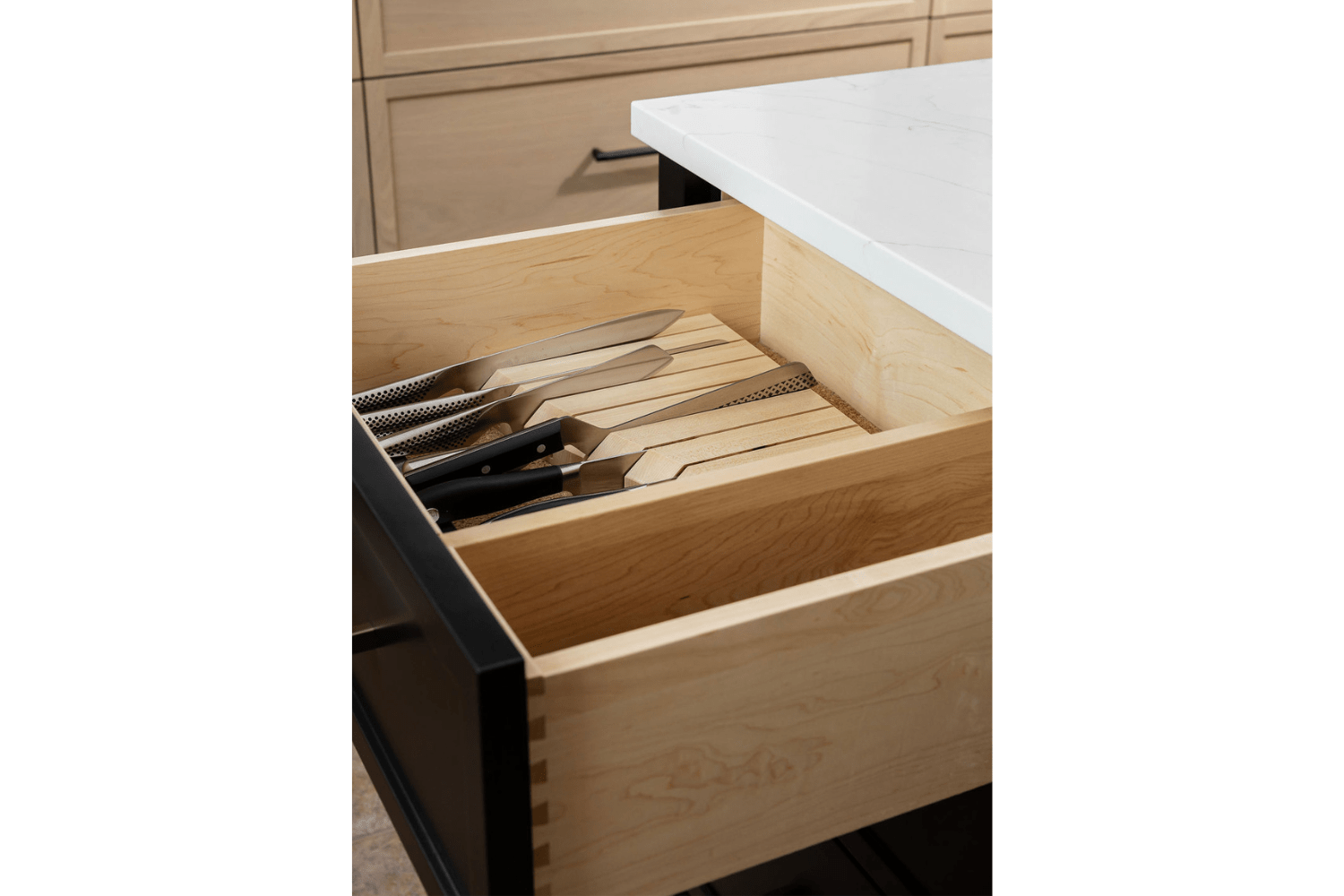 Custom knife block drawer in a maple dovetail drawer