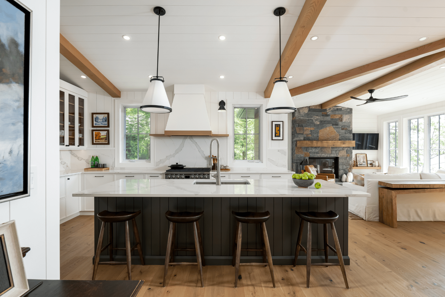 Modern white cottage kitchen with black panelled kitchen island