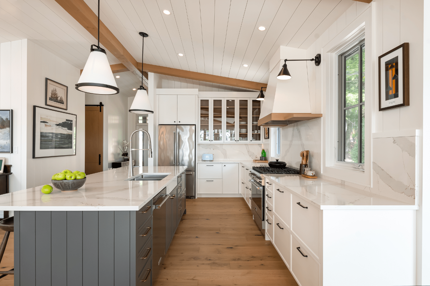 Panelled kitchen island with kerf lines in white cottage kitchen