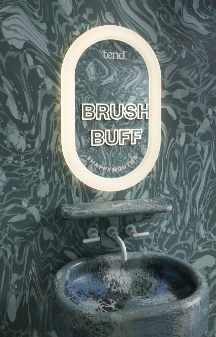 Sink and mirror in teeth brushing area.