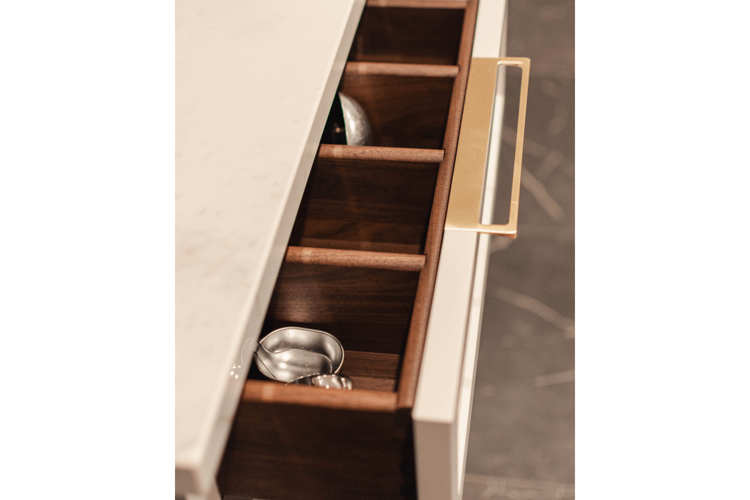 Custom utensil divider drawer with walnut interior