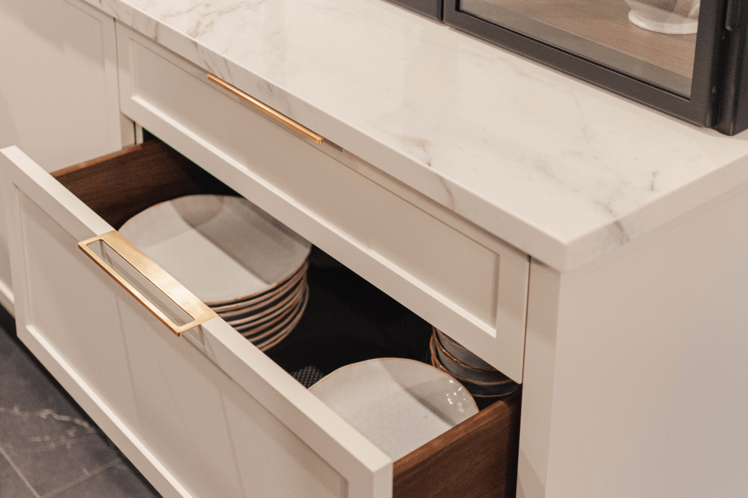 Plate drawer with walnut interior and brass pulls