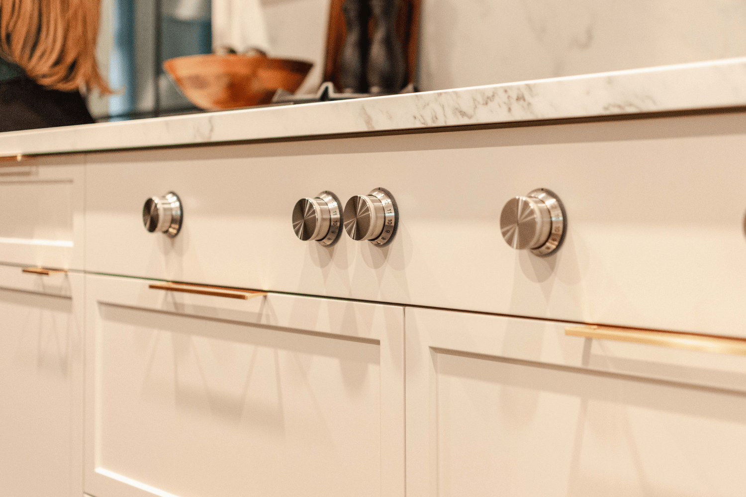 Stove top front with custom millwork to match the cabinetry