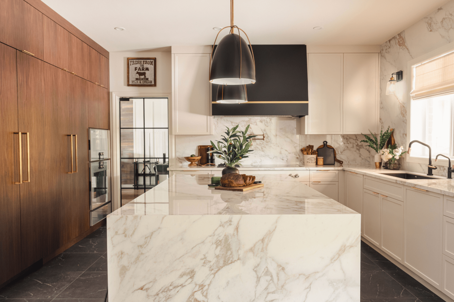 Transitional 3-tone kitchen with cream and walnut cabinetry