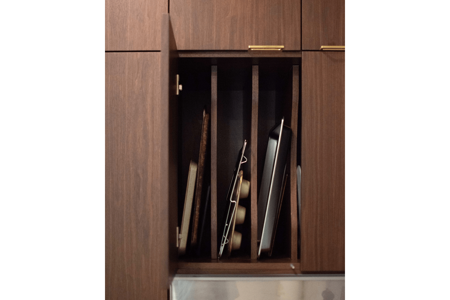 Custom baking sheet cupboard with tray dividers