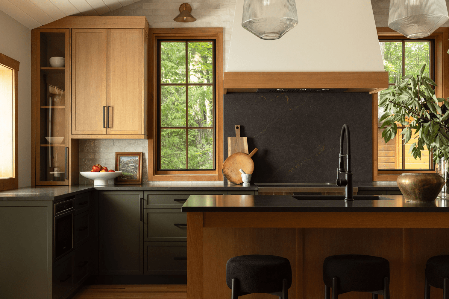 Modern cottage kitchen design with earthy green cabinets