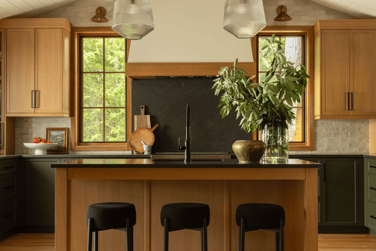 Modern kitchen design with red oak and green cabinets