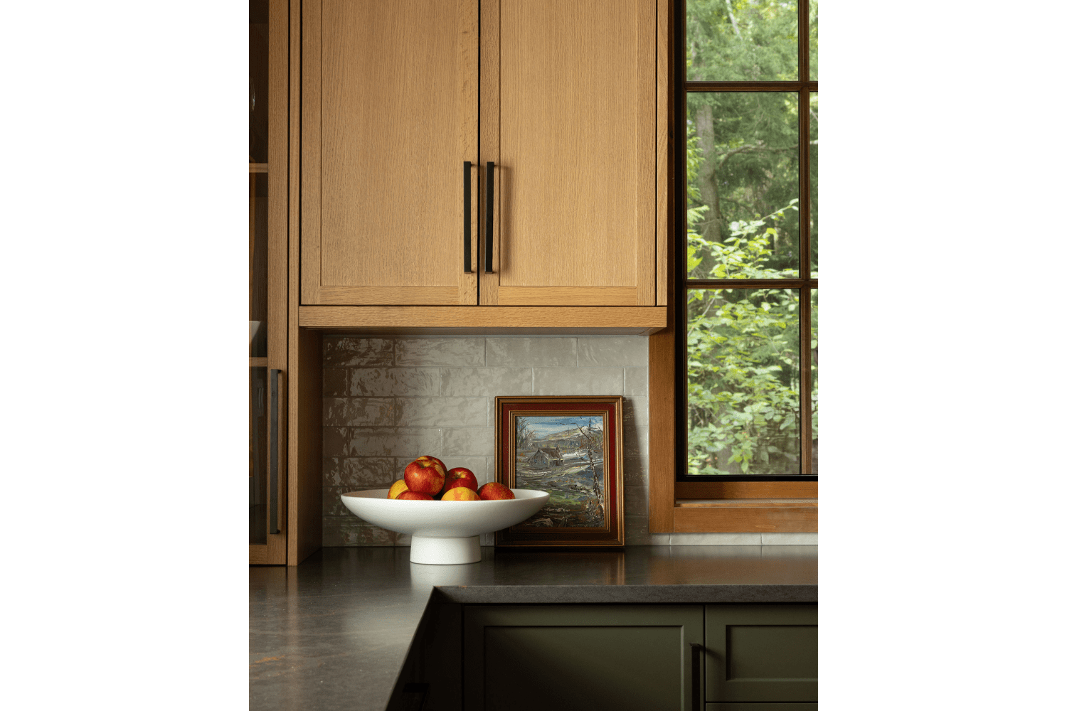 Red oak and green kitchen with white glossy backsplash tiles