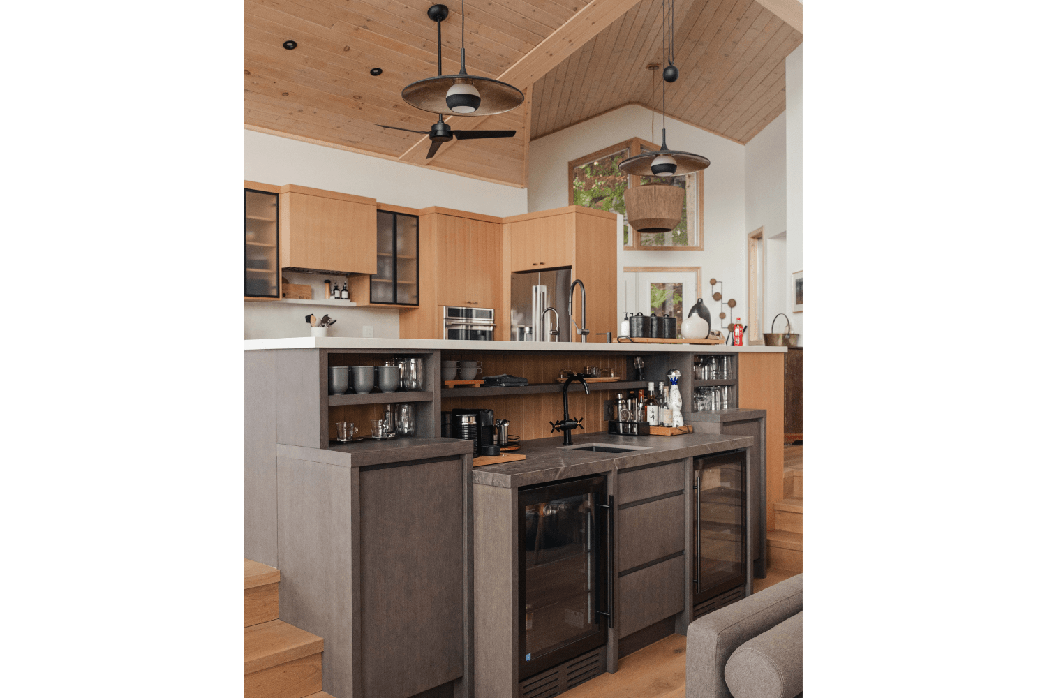 Living room wet bar connected with kitchen island