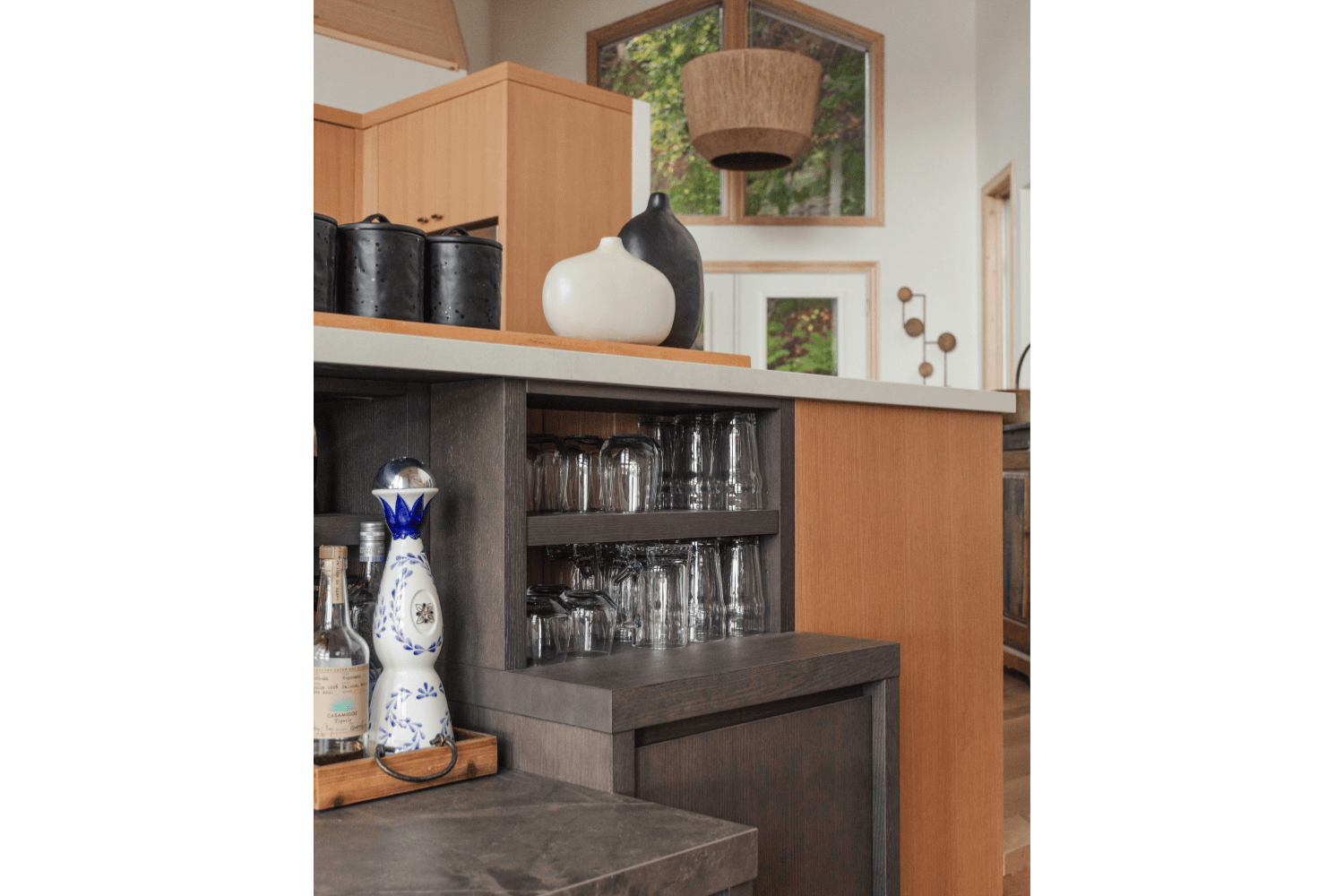Living room wet bar integrated into kitchen island