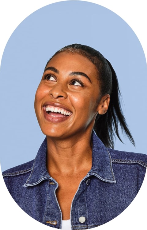 Woman smiling and looking up to the left