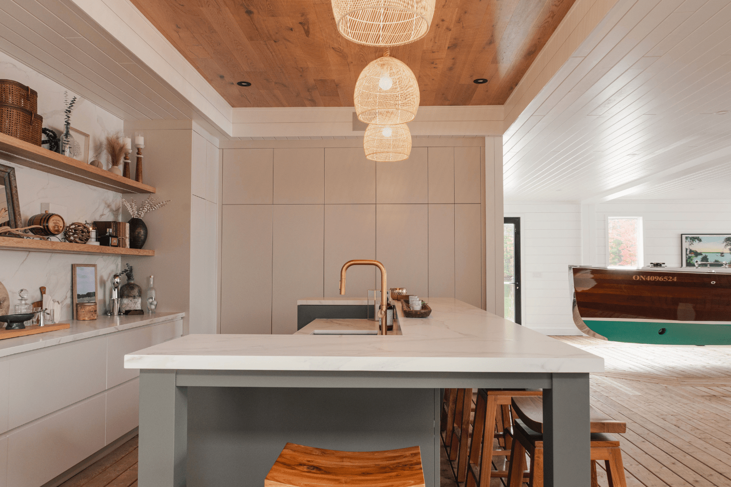 Boathouse bar and lounge with marine-grade cabinetry