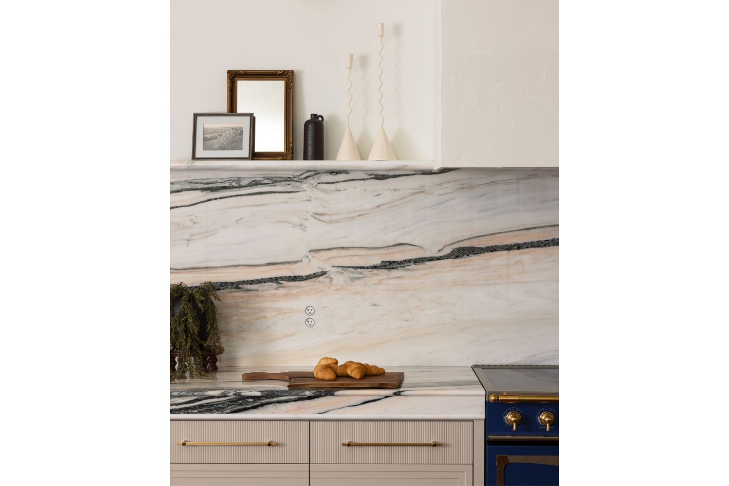 Thick marble countertop and backsplash with dramatic veining