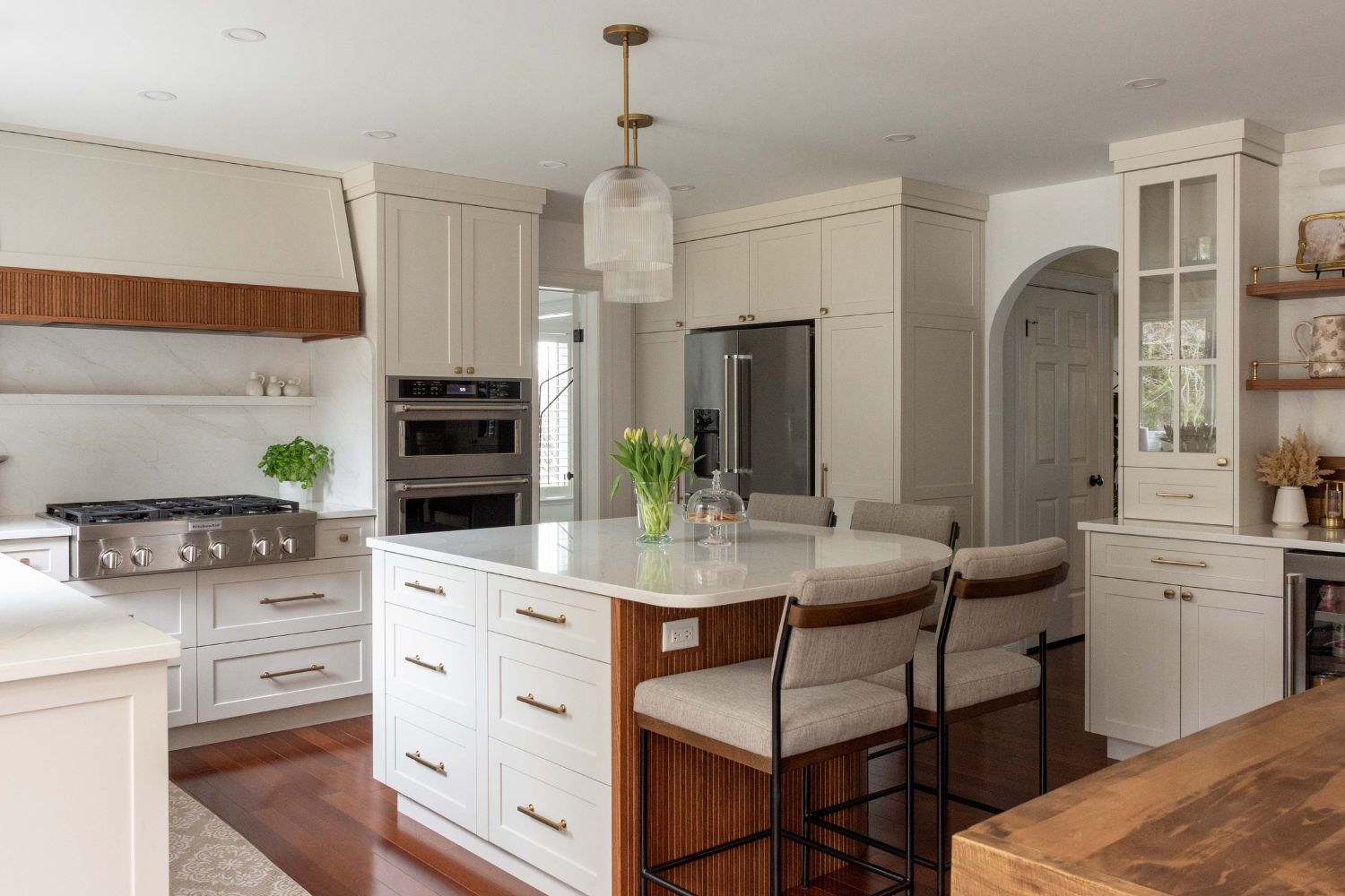 Timeless greige kitchen design with red oak slatted accents